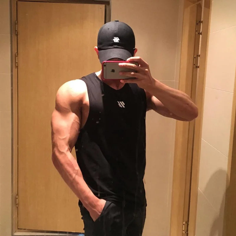 Men’s Bodybuilding Tank Top. Designed for lifters who demand comfort and freedom of movement. Train smarter, perform stronger, and look sharper.